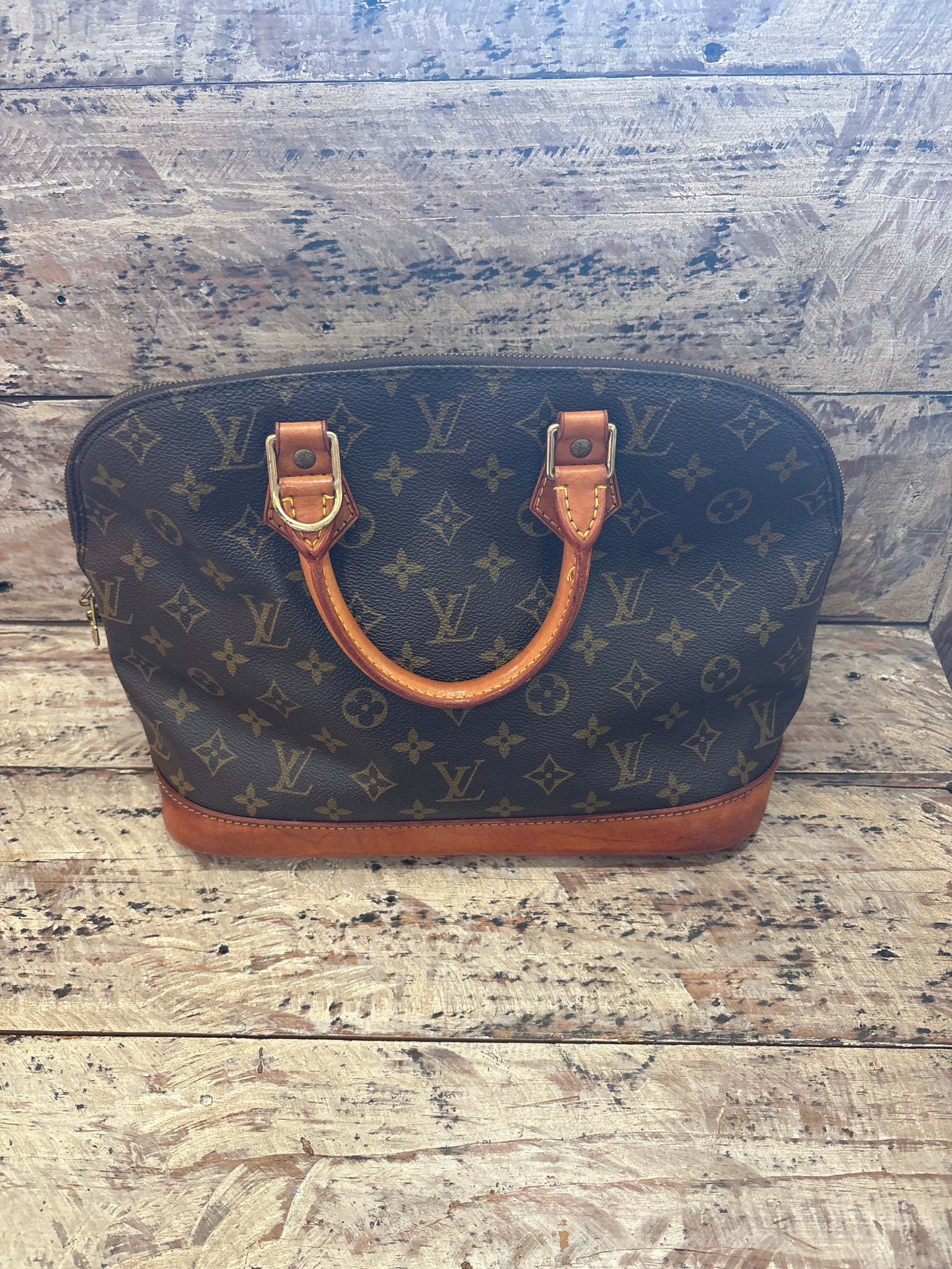 LV152(c)- Louis Vuitton Alma PM