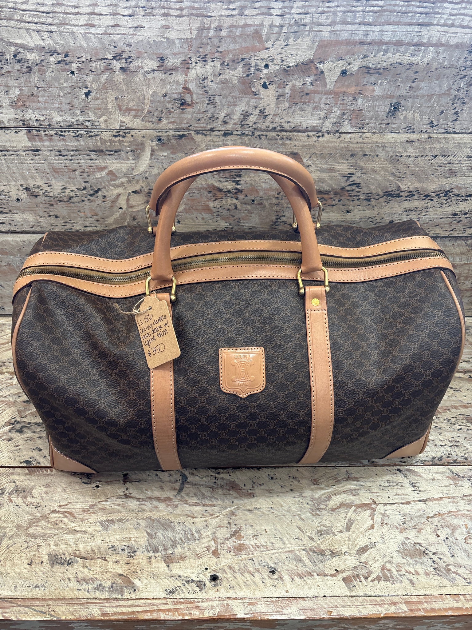 LV186- Celine duffle bag dark with light trim