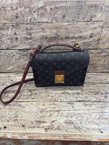 LV110- Louis Vuitton buckle bag with lock and keys